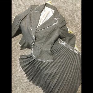 Designer skirt suit by Aqua